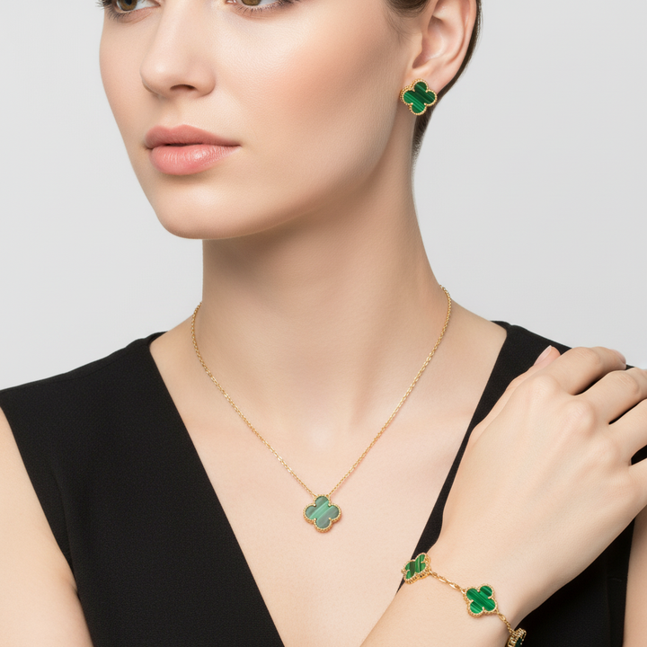 Beautifully crafted women's four-leaf clover necklace with matching earrings, a classic and lucky jewelry set