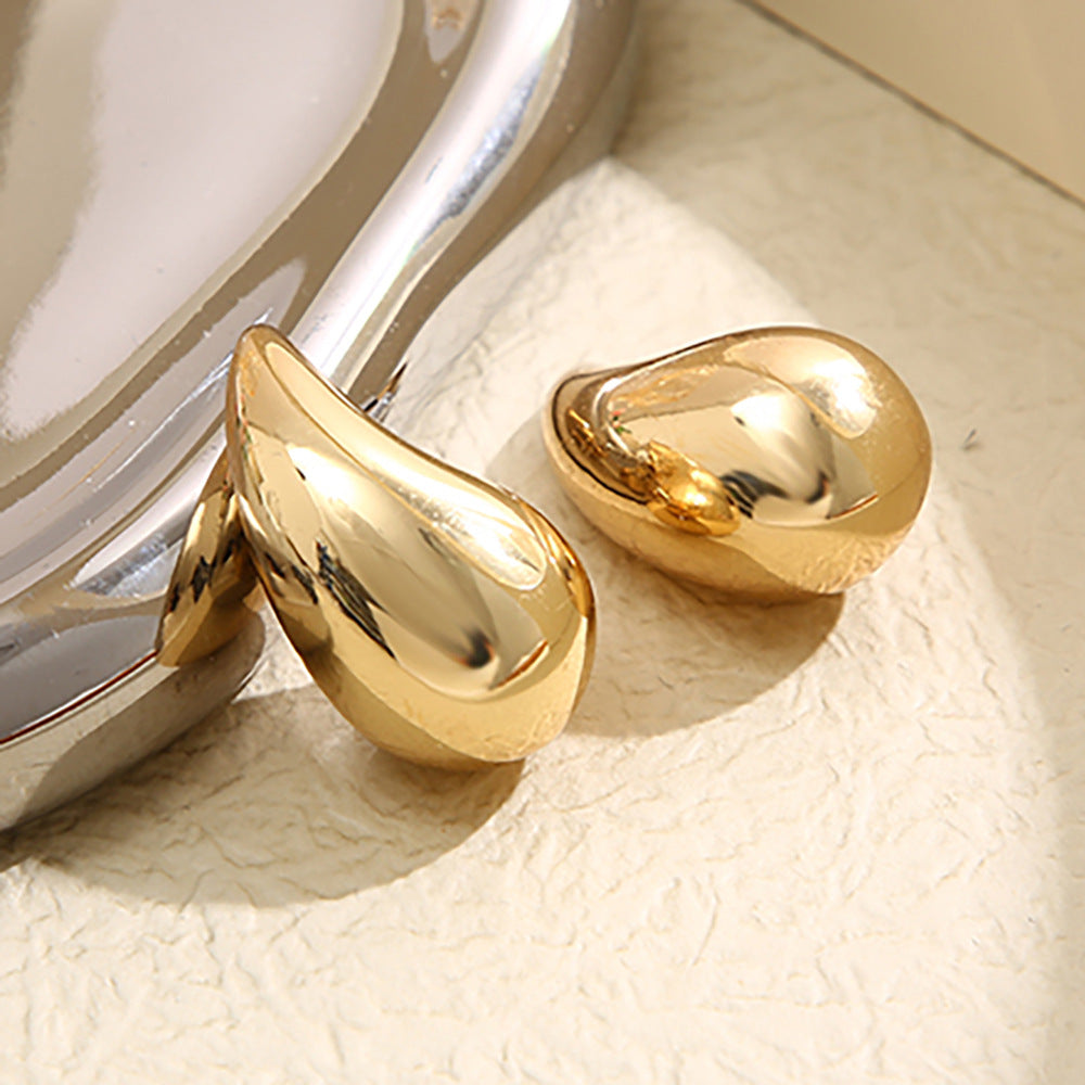 Fashionable GlimmerDrop dangle earrings. Sparkling droplet design, ideal elegant jewelry for women.