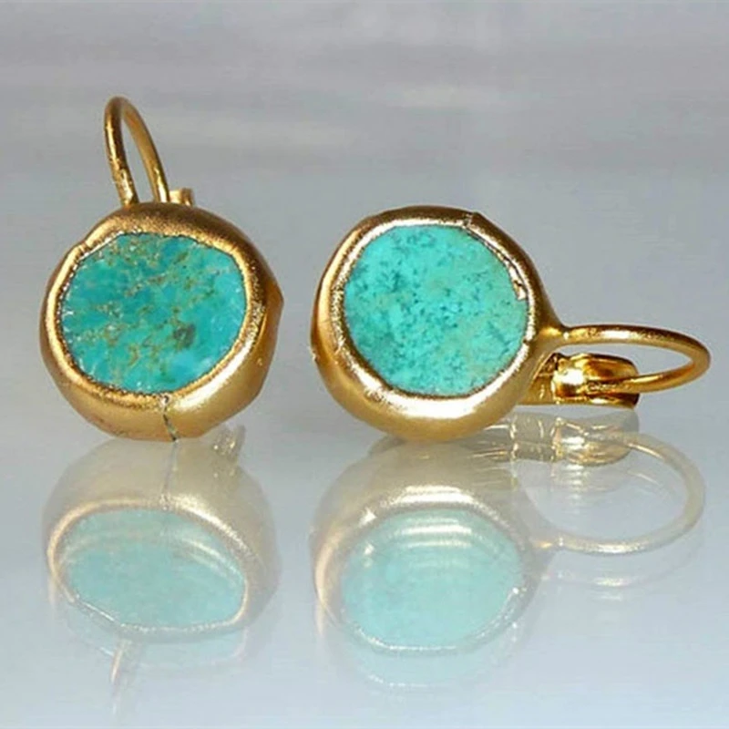 Elegant women's gold plated dangle earrings with turquoise drops, perfect handmade jewelry accessory.