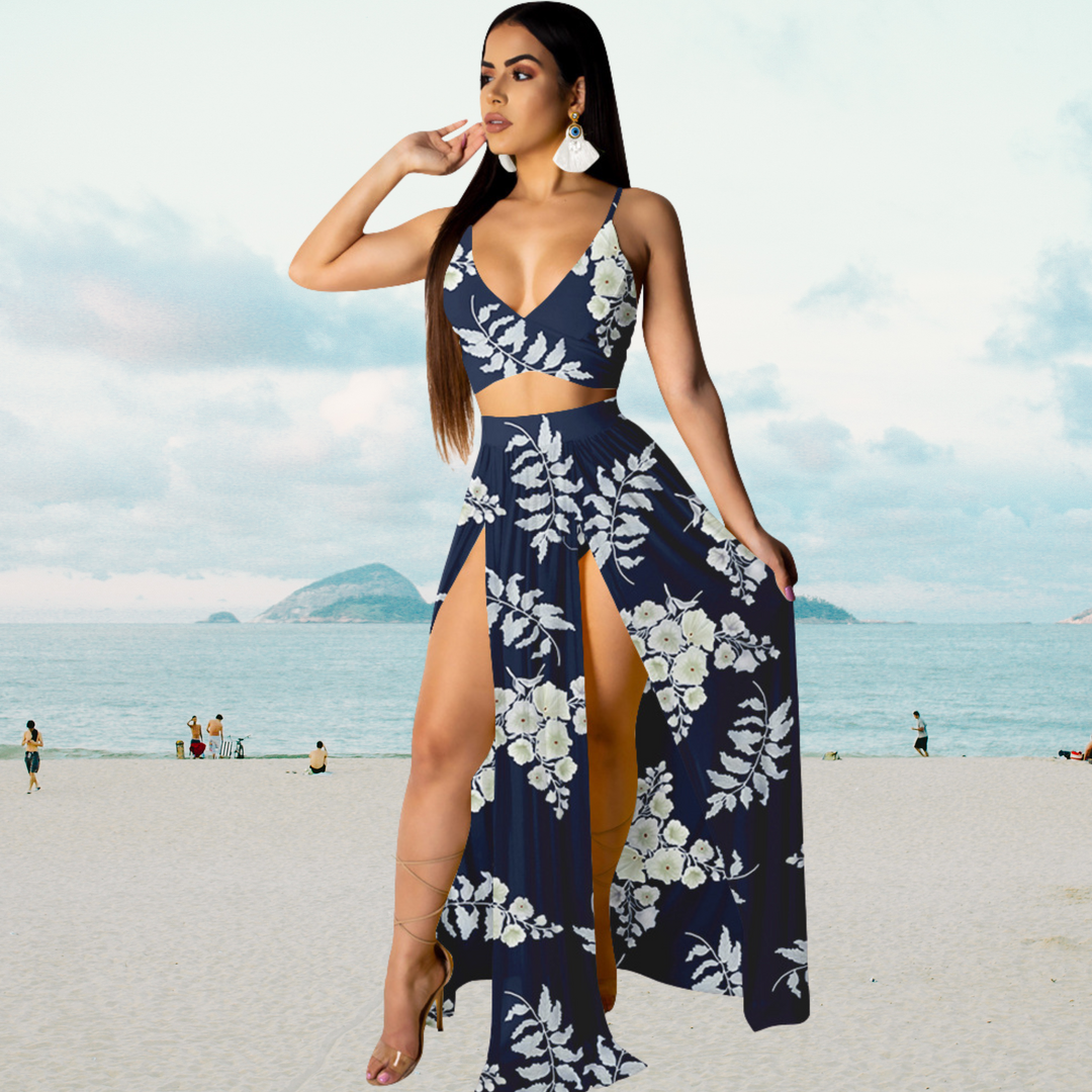 Opulent women's summer outfit: green halter top and long split skirt, embodying elegant party wear