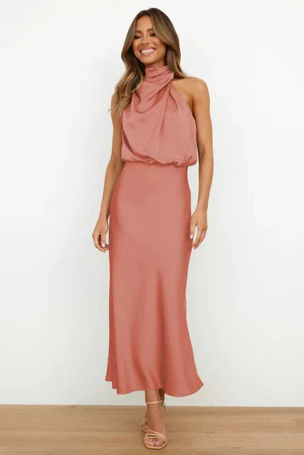 Sophisticated women's high neck satin gown. A chic sleeveless formal dress for summer events.