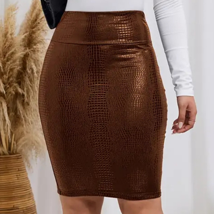 Stylish women's high-waist mini skirt with a distinctive crocodile print, perfect for any occasion.