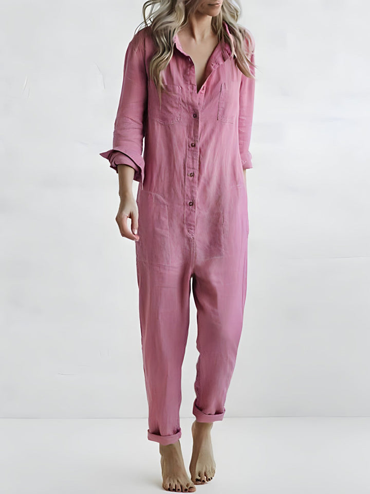 Elegant women's jumpsuit with a versatile reversible collar, perfect for sophisticated style. Long sleeve, solid color.