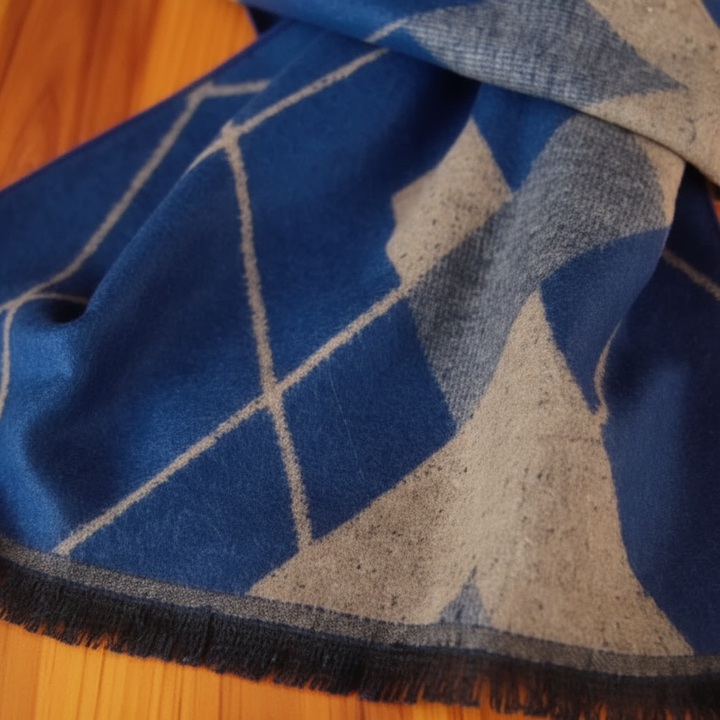 Close-up of a women's knitted silk cashmere scarf, highlighting its soft texture and quality.