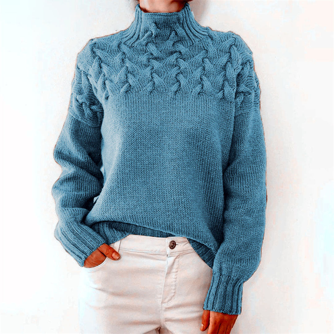 Elegant women's knitted turtleneck sweater. Cozy long sleeve top perfect for chic winter fashion.