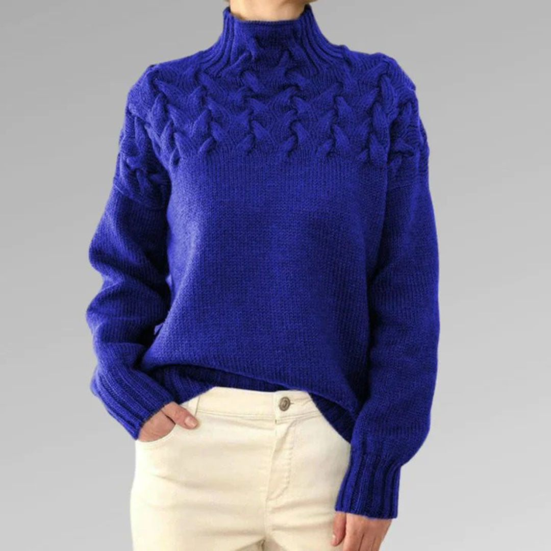 Women's elegant & cozy knitted turtleneck sweater. Stylish long sleeve winter top for chic comfort.