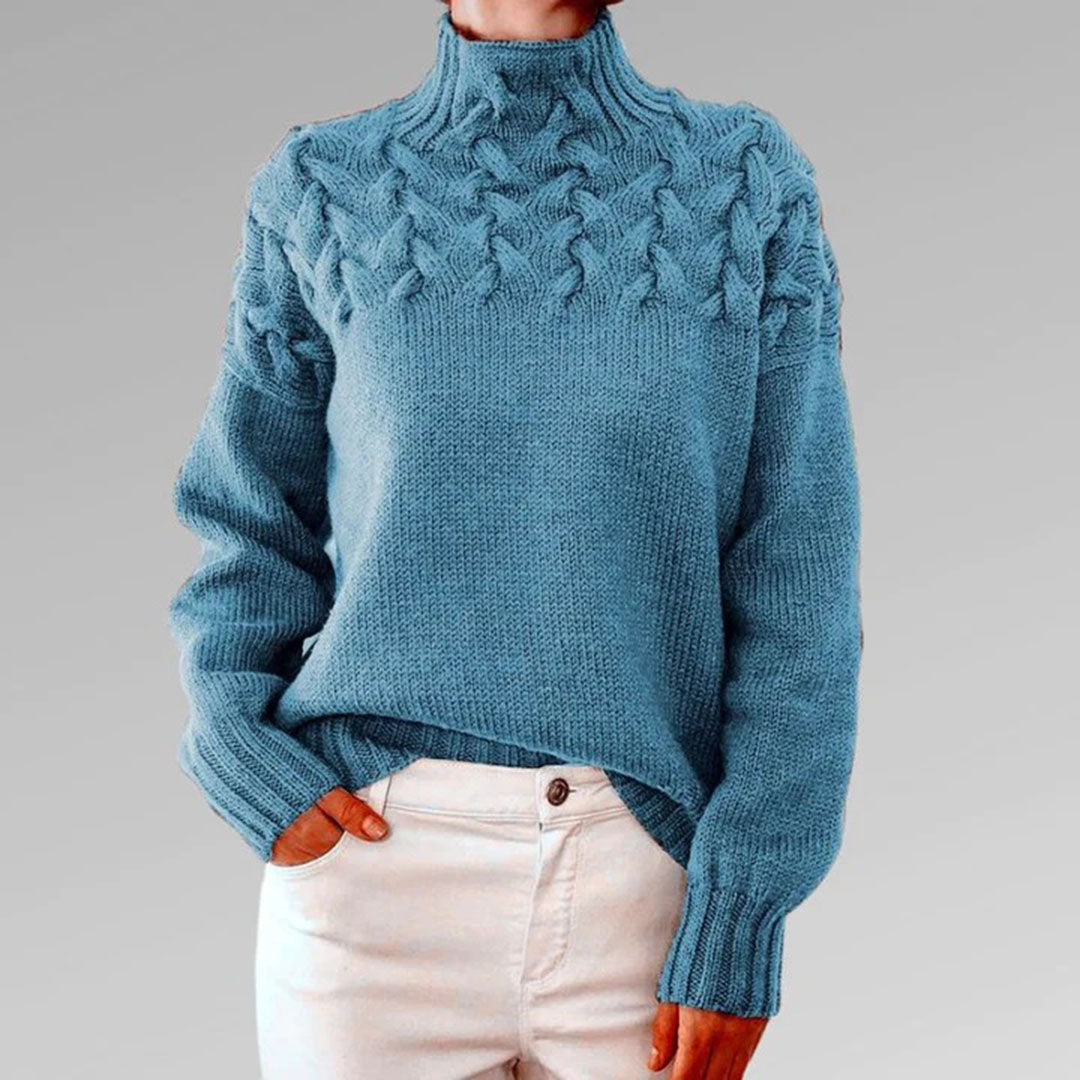 Chic women's knitted turtleneck sweater. Soft, comfortable long sleeve knit top for stylish winter wear.