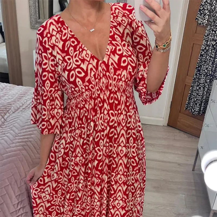 Elegant women's long floral maxi dress with V-neck, perfect for summer fashion.