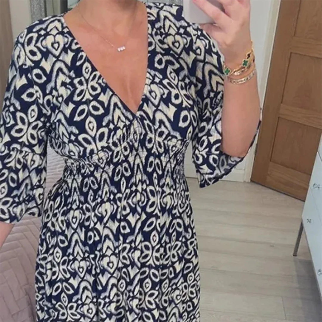 V-neck long floral maxi dress for women, ideal for elegant summer events or casual outings.