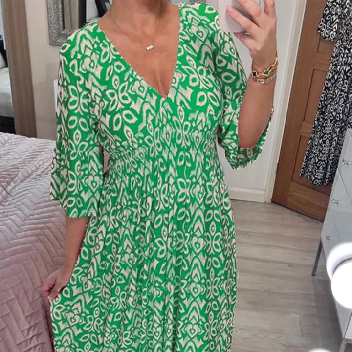 Flowing vintage-style floral maxi dress, women's V-neck for comfortable summer fashion.
