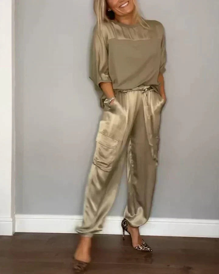 Elegant women's lustrous jumpsuit for special evenings, featuring a chic and formal all-in-one design.