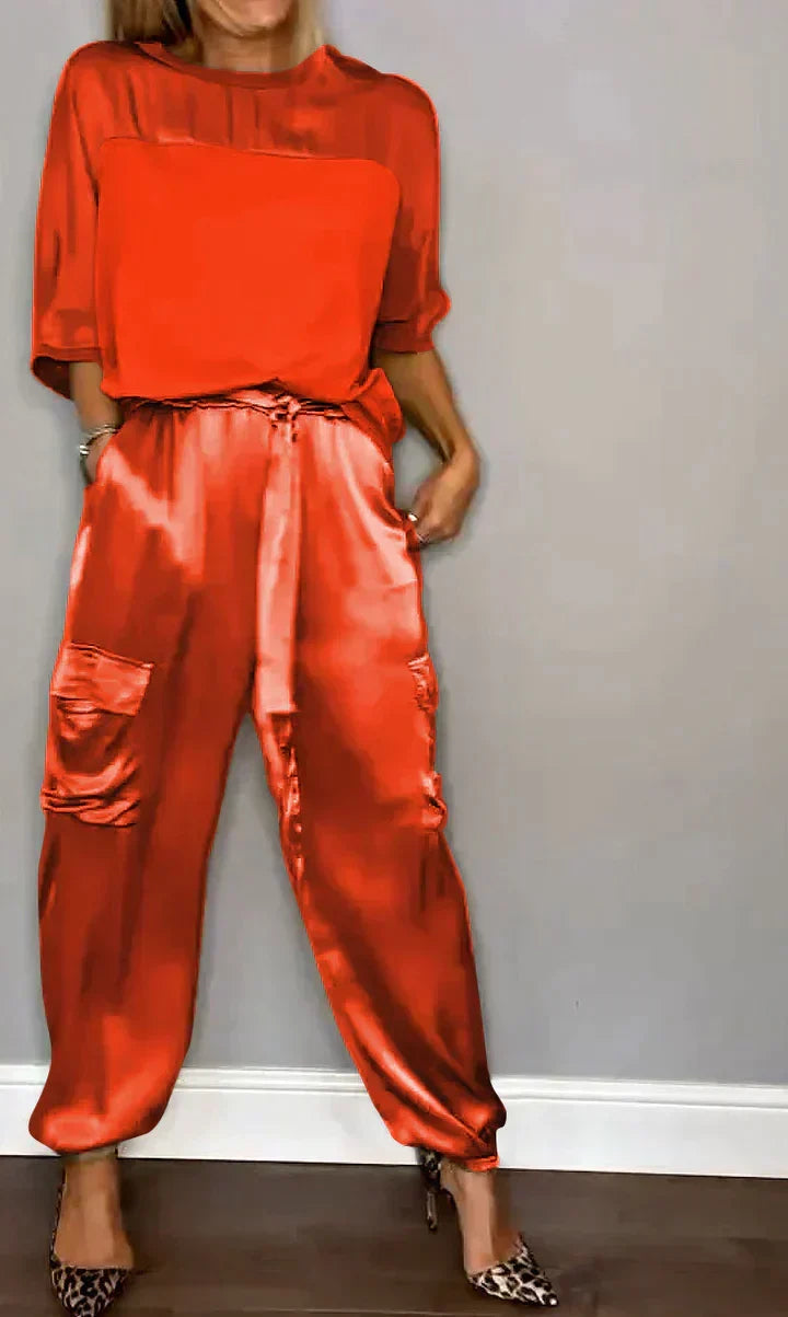 Flowy lustrous women's jumpsuit, offering a comfortable and elegant fit for any special occasion.