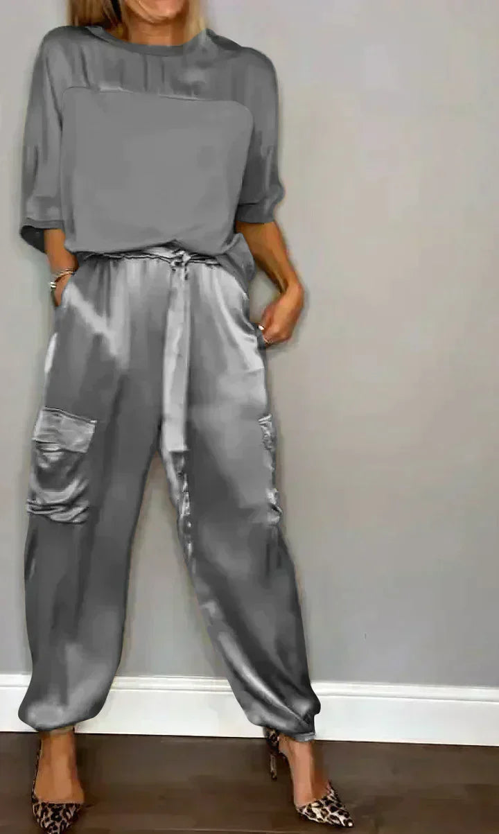 Lustrous women's elegant jumpsuit, ideal for creating a chic and stylish evening wear look.