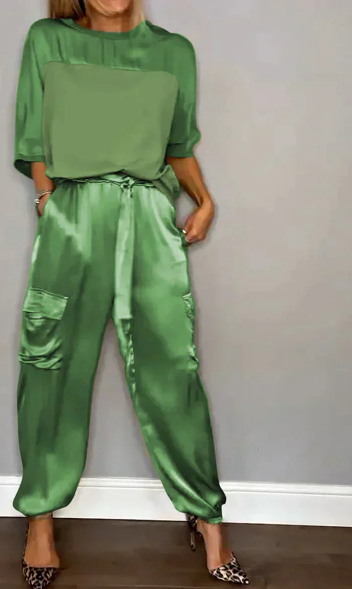 Chic women's lustrous jumpsuit for elegant evening wear. A stylish, versatile, all-in-one outfit.
