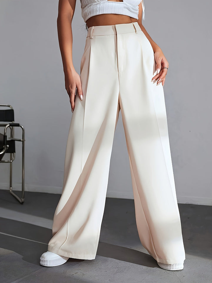 Elegant women's luxury wide leg trousers in a solid color, offering a comfortable and chic, relaxed fit. Versatile fashion.