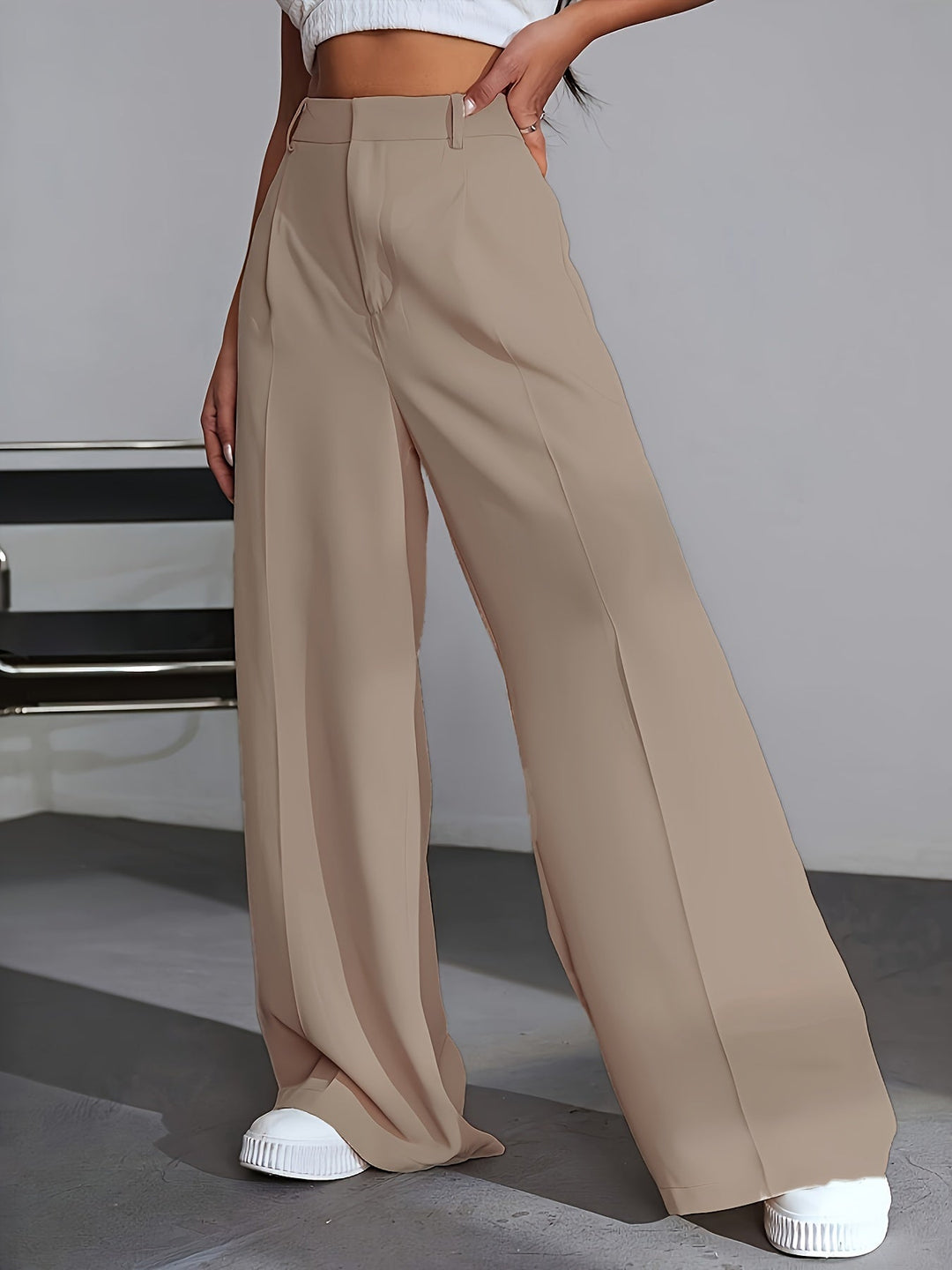 Lana luxury wide leg trousers for women, solid color, providing an elegant and comfortable relaxed fit for everyday wear.
