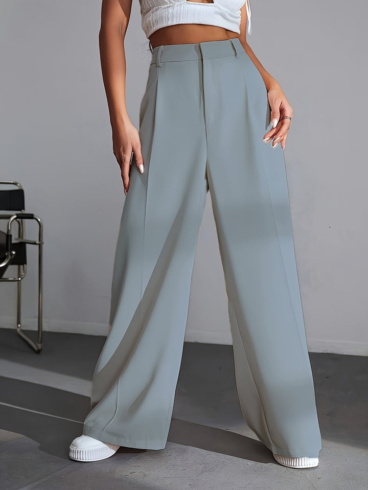 Soft & comfortable Lana wide leg luxury trousers for women in a solid color, featuring an elegant relaxed fit.