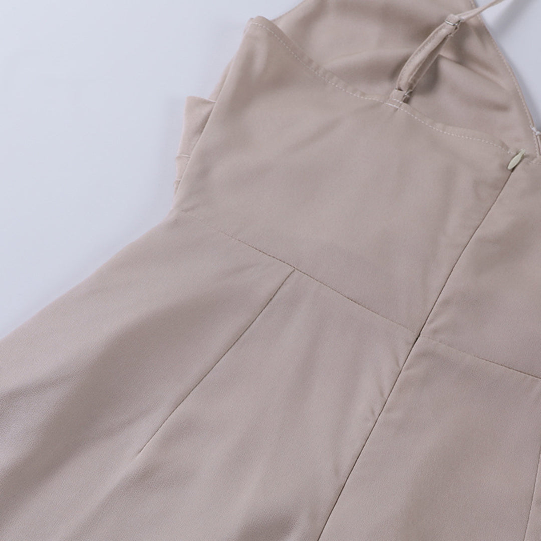 Women's elegant spaghetti strap midi dress, a chic option for cocktail parties and events.