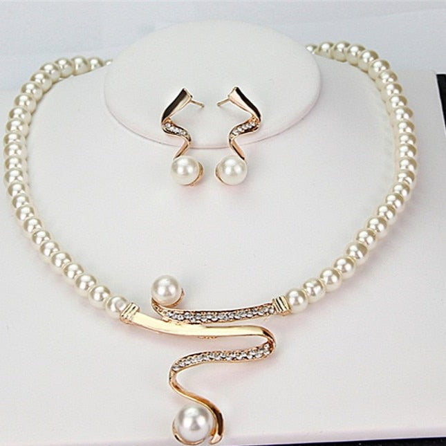 Elegant women's natural pearl necklace and earring set. Classic, timeless jewelry for her.