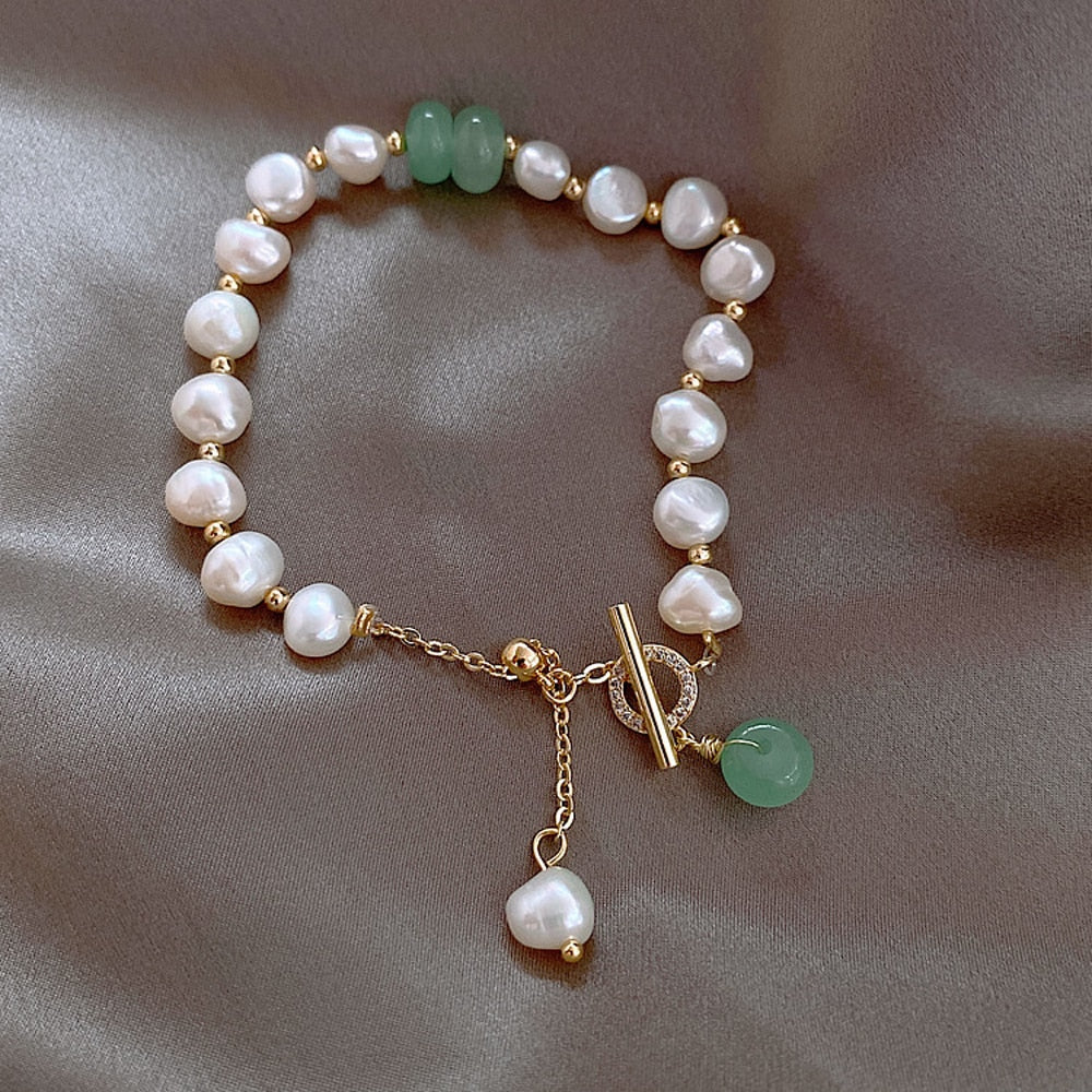 Handcrafted women's ocean pearl bracelet featuring lustrous pearls and durable design. Elegant adventure jewelry.