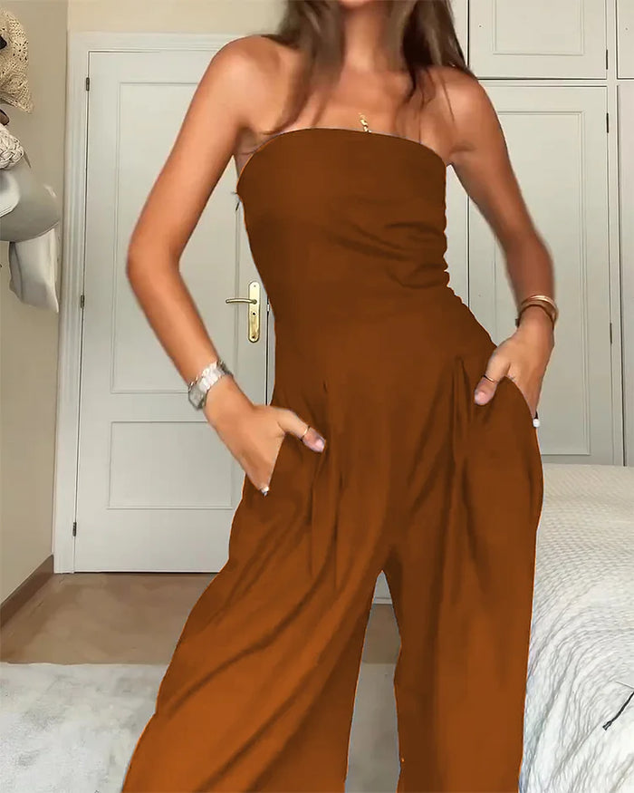 Elegant women's off-shoulder wide-leg jumpsuit in black, perfect for party wear.