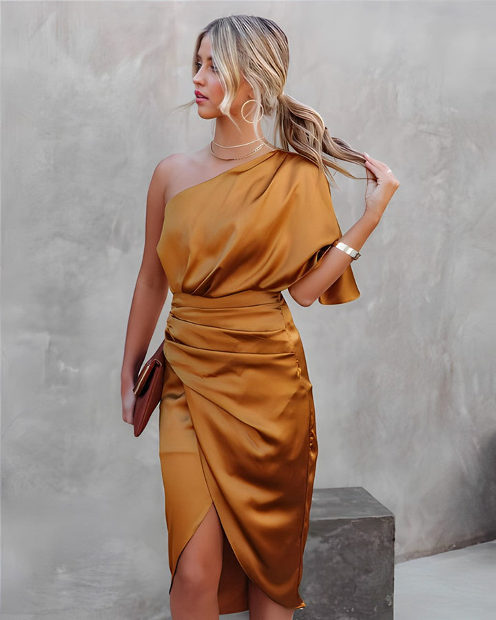 Model in a stylish one-shoulder special occasion dress, elegant and perfect for evening & party fashion.