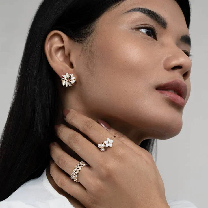 Delicate flower petal earrings crafted with iridescent opal stones, elegant women's jewelry.