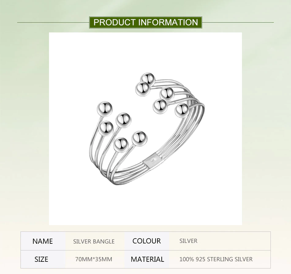 Polished women's open cuff bracelet with radiant silver beads. Adjustable and a perfect sophisticated fashion accessory.