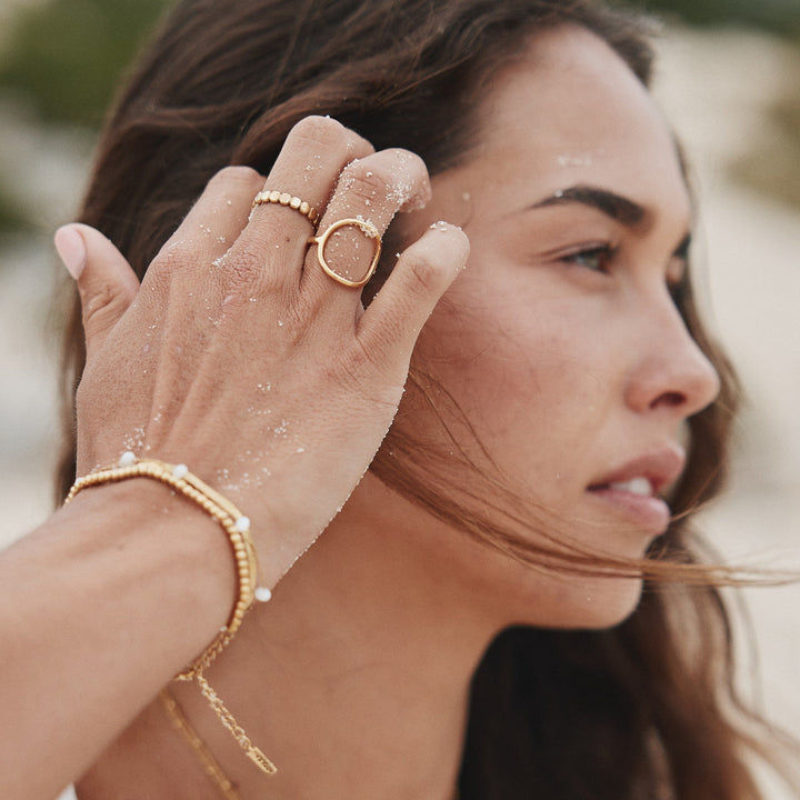 Perfect gift: Women's elegant gold oval ring, a durable & stylish fashion accessory.