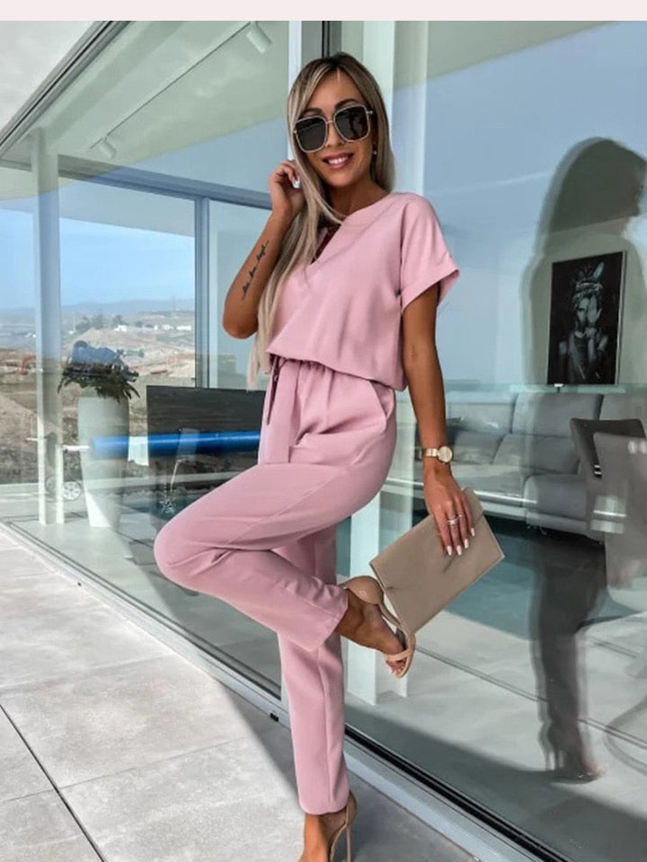 Versatile women's Patty jumpsuit for formal wear or casual outings. Elegant wide leg and chic V-neck style.