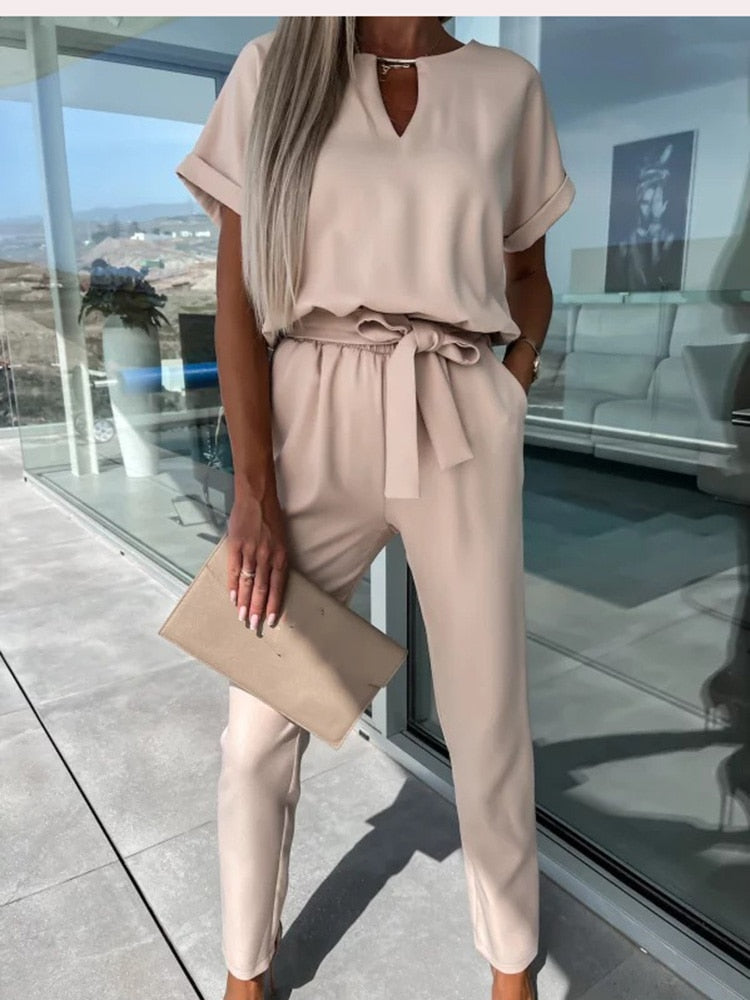 Modern women's Patty jumpsuit with elegant wide leg & V-neck silhouette. A stylish and comfortable fashion choice.