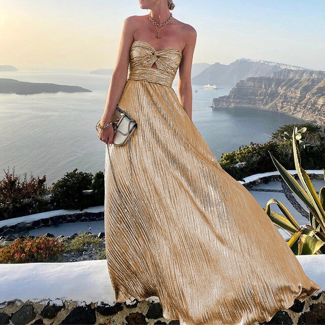 Flattering pink V-neck maxi dress with a cinched waist for women, suitable for summer parties and casual wear.