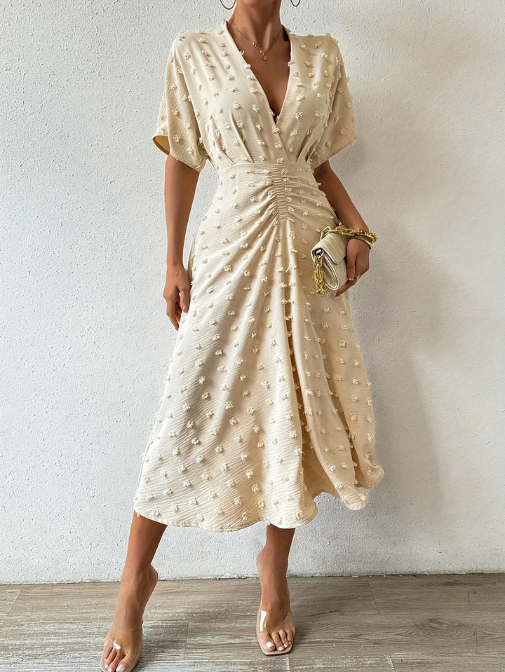 Women's elegant pleated ruffle midi dress. Ideal as an evening, cocktail, or special occasion party dress.