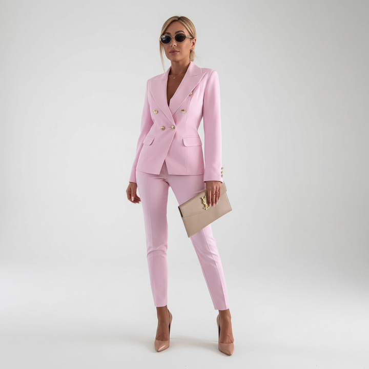 Back view of a women's professional two-piece slim-fit blazer and pants outfit for work