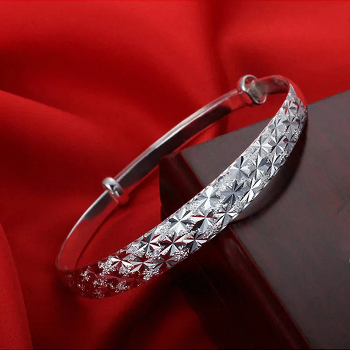 Elegant Women's Radiant Star Armband Bracelet, sterling silver jewelry featuring a beautiful celestial star design.