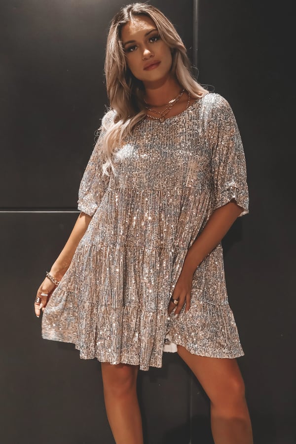 Women's elegant Shimmerflow sequin A-line dress, midi length, perfect for formal parties and evening wear.
