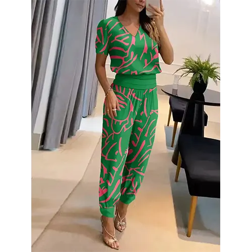 Casual women's wide leg short sleeve jumpsuit romper, a comfortable one-piece outfit for summer.