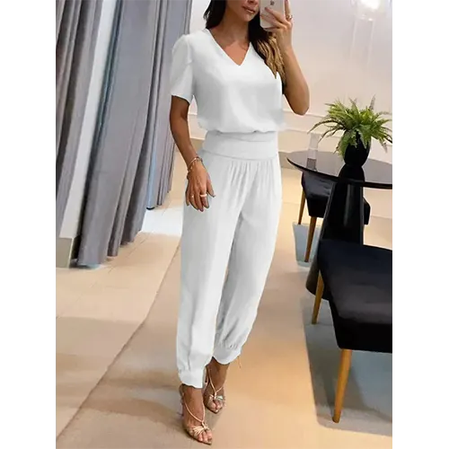 Trendy women's short sleeve wide leg jumpsuit. Fashionable one-piece romper for spring and summer style.
