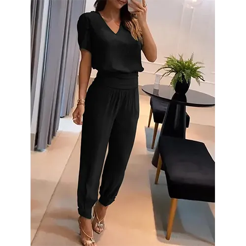 Stylish women's wide leg short sleeve jumpsuit, a comfortable and trendy one-piece for casual wear.