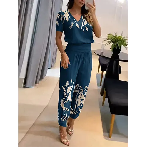 Fashion-forward women's wide leg jumpsuit, short sleeve, one-piece design for chic spring & summer.