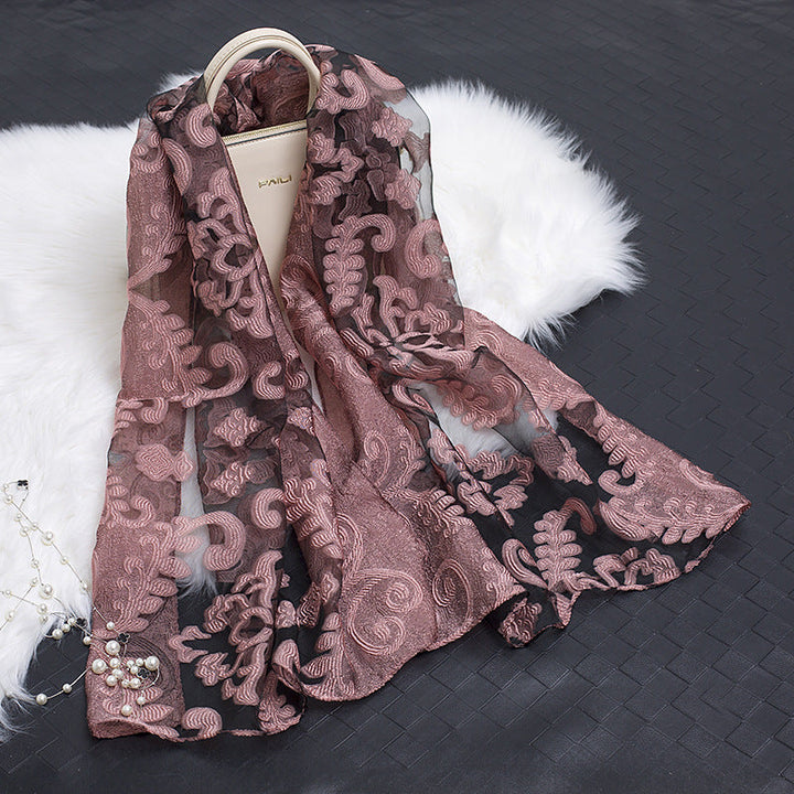 Exquisite women's organza floral scarf, highlighting a delicate cut-out design.