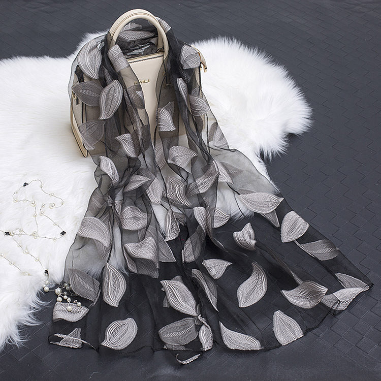 Beautiful women's silk floral scarf, showcasing a modern cut-out design.