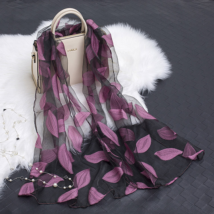 Chic floral cut-out organza blend scarf for women, adding a touch of elegance.