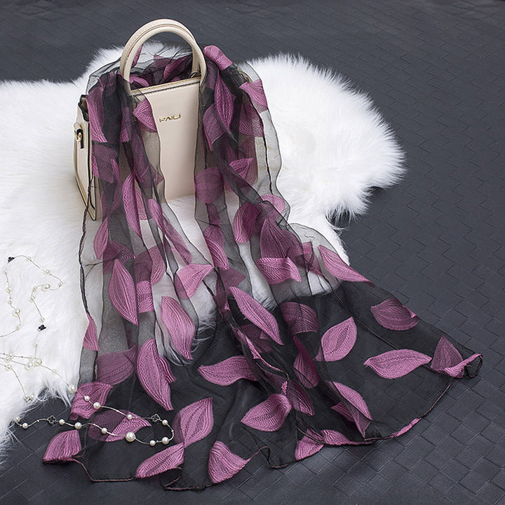 Chic floral cut-out organza blend scarf for women, adding a touch of elegance.