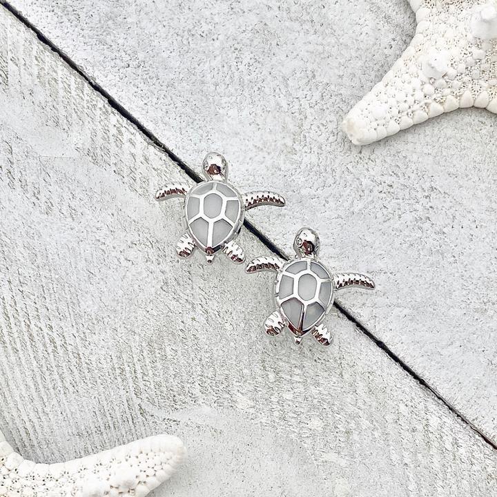 Beautiful women's silver & opal sea turtle earrings, ocean-inspired animal jewelry, ideal gift for nature lovers.