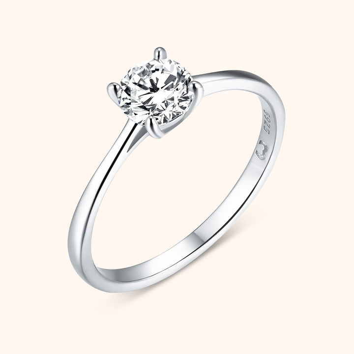 Elegant women's solitaire zirconia ring, sterling silver with dazzling sparkle, perfect fine jewelry.