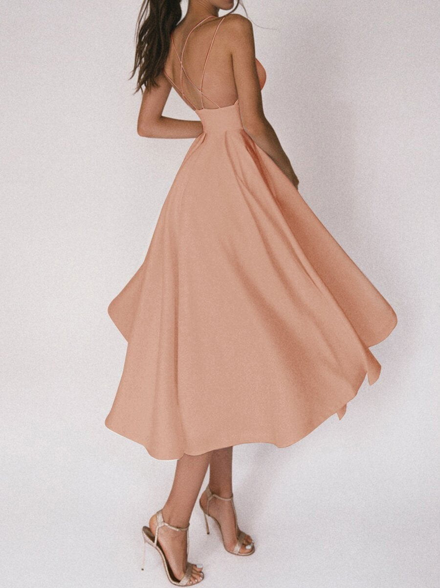 Sophisticated women's V-neck midi dress with straps, ideal for elegant day or evening wear.