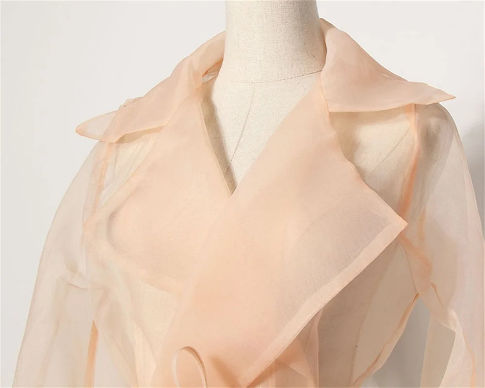 Women's elegant belted summer two-piece set featuring a stylish top and matching skirt.