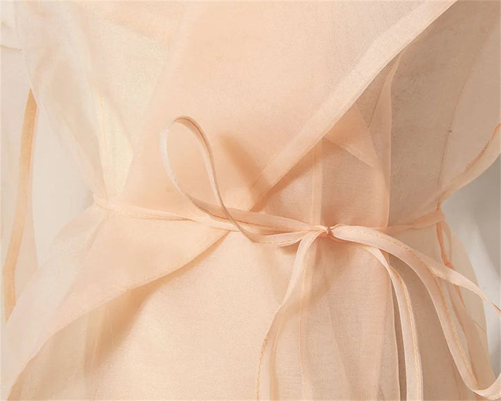 Elegant women's belted two-piece summer skirt set for ladies' formal or evening attire.