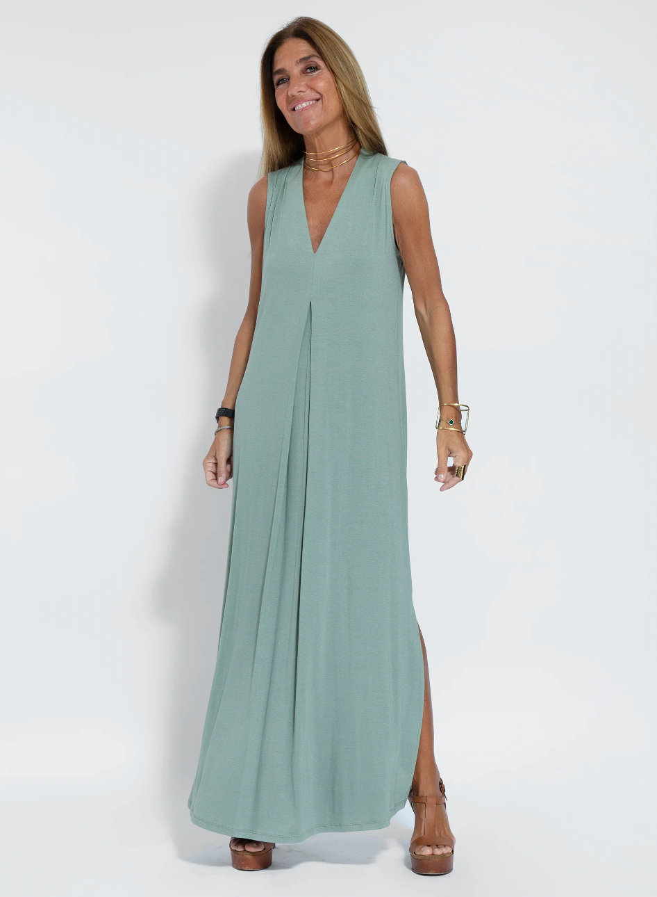 A must-have women's two-piece dress and tailored vest set. This slimming ensemble is a wardrobe essential.